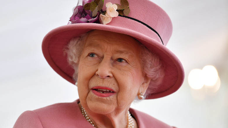 Queen Elizabeth in pink hat and coat