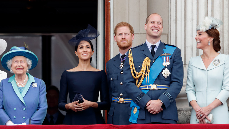 Queen Elizabeth, Duchess Megan Markle, Prince Harry, Prince William and Princess Kate at Buckingham Palace