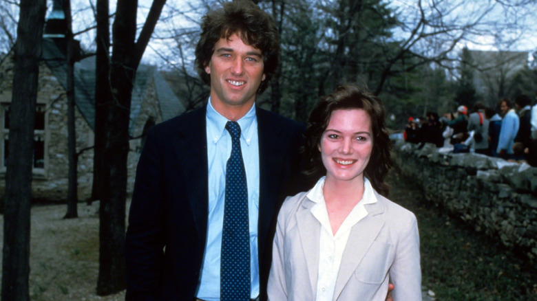 Robert Kennedy Jr. and Emily Ruth Black standing together outside, smiling at the camera