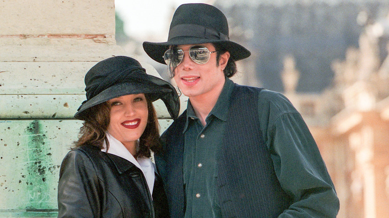 Lisa Marie Presley and Michael Jackson smiling in France, 1994