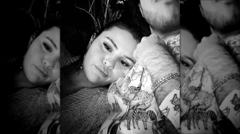 Selena Gomez and Benny Blanco cuddling