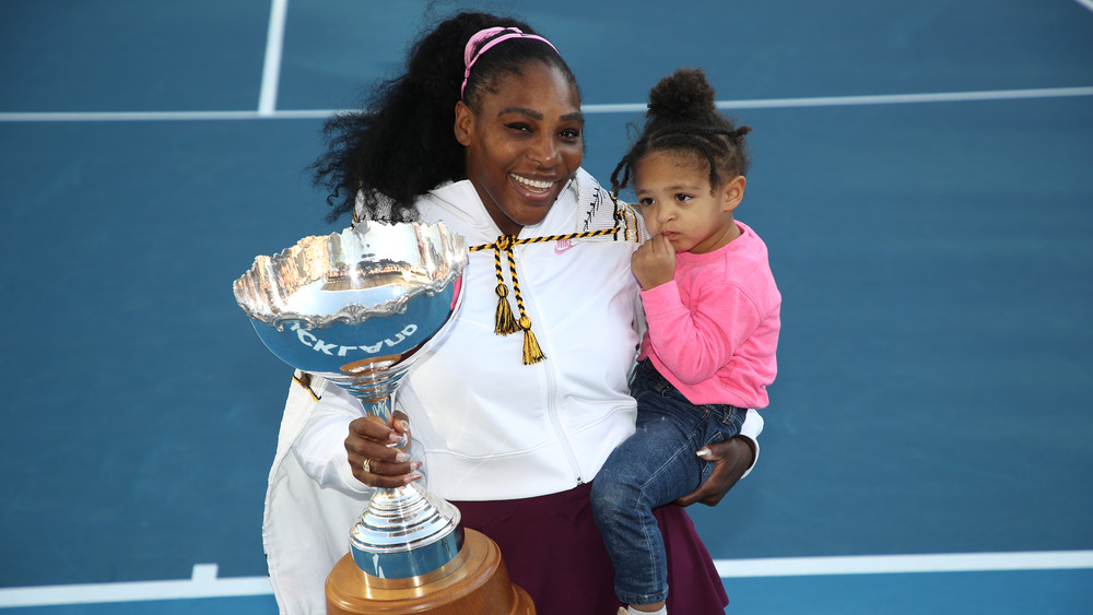 Serena Williams and her daughter after winning tournament in New Zealand