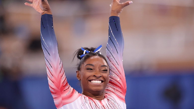 Simone Biles posing at the 2021 Olympics in Tokyo