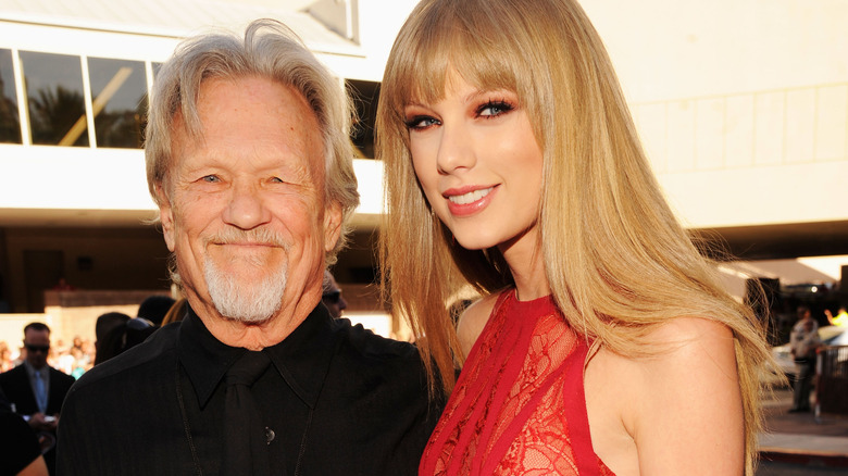 Kris Kristofferson and Taylor Swift smiling