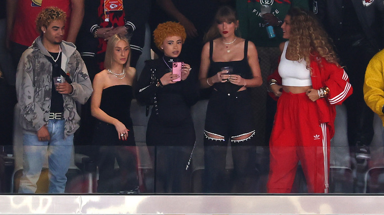 Taylor Swift watching football from a box suite