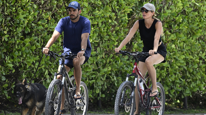 Gisele Bündchen and Joaquim Valente on a bike ride in Florida July 2024