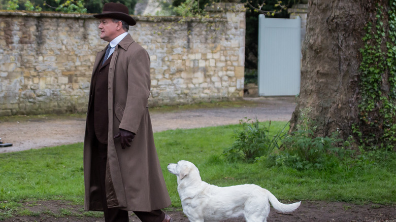 Hugh Bonneville walking in Downton Abbey