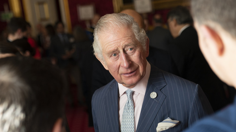 Prince Charles speaking to someone