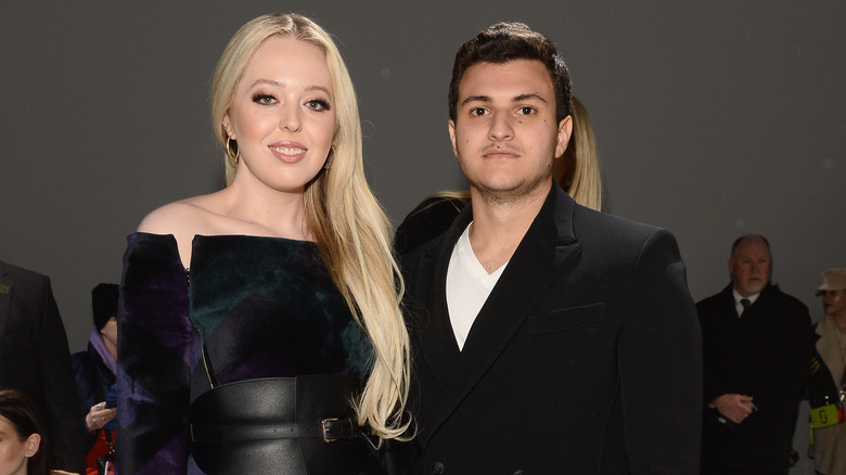 Tiffany Trump and Michael Boulos posing 