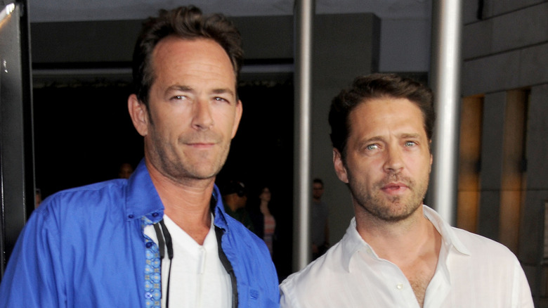 Luke Perry and Jason Priestley smiling