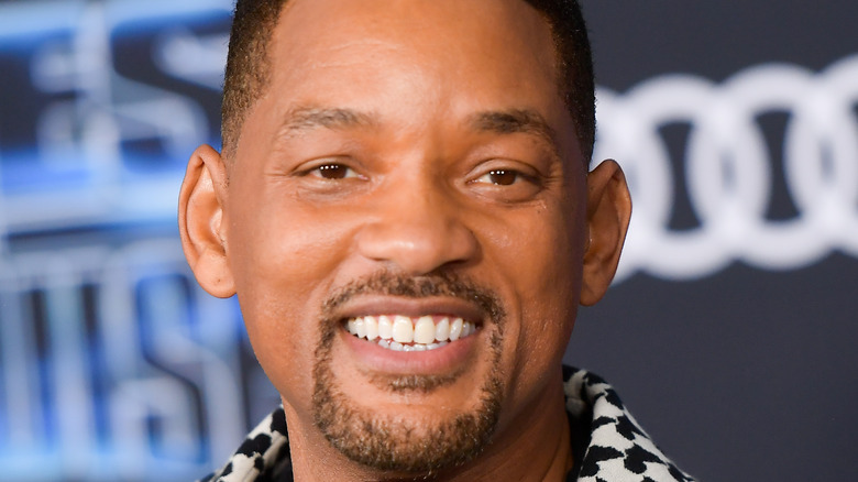 Will Smith smiling for photo 