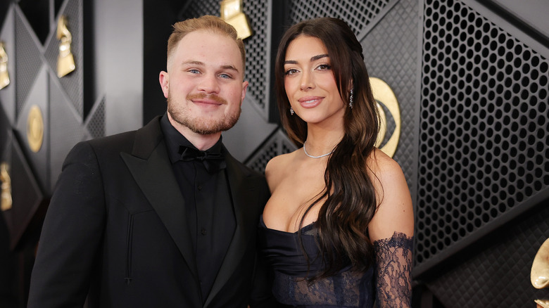 Zach Bryan and Brianna LaPaglia posing together