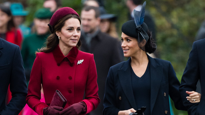 Princess Catherine and Meghan Markle walking and talking