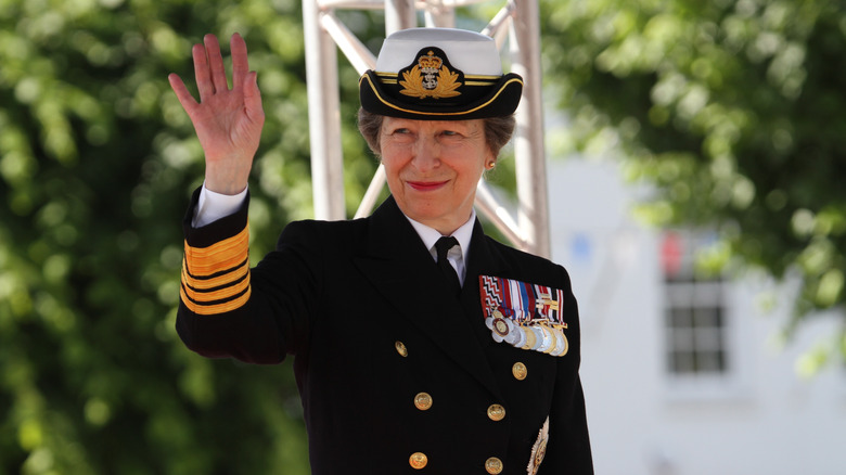 Princess Anne waving in uniform