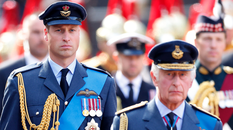 Prince William and King Charles in uniform