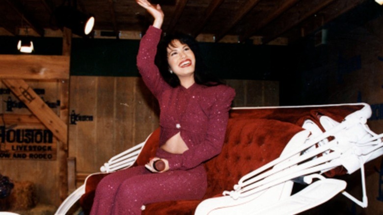 Selena Quintanilla waves to a crowd