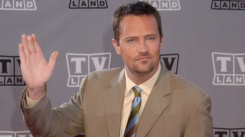 Matthew Perry waving