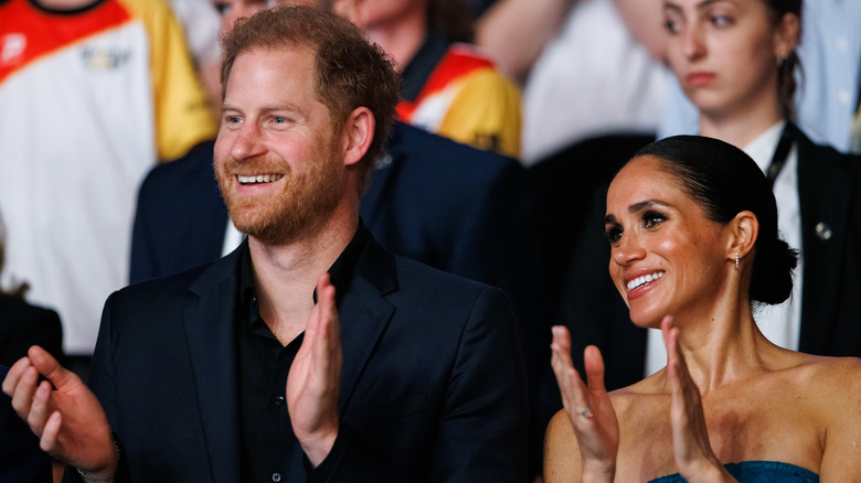 Prince harry and meghan markle smiling