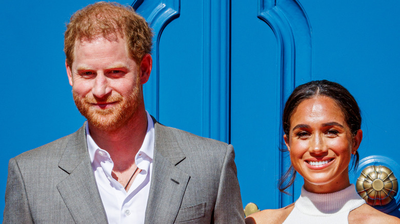 Prince Harry and Meghan Markle smiling 