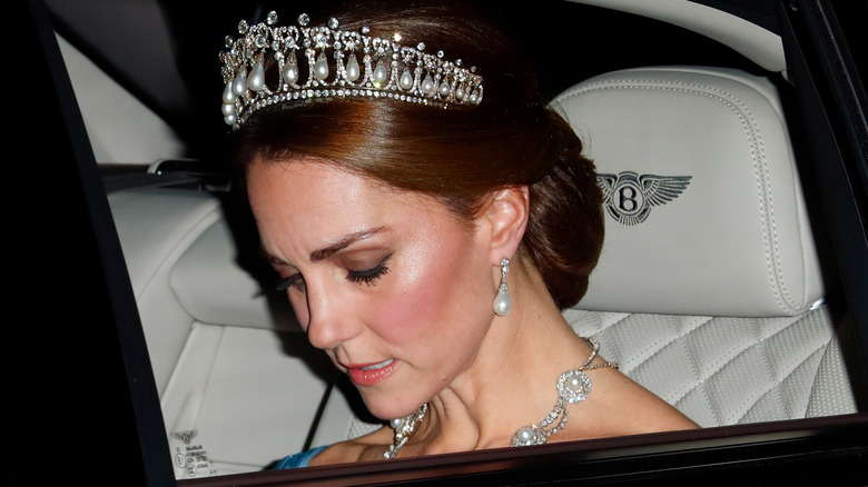 Princess Catherine in car wearing tiara and jewels