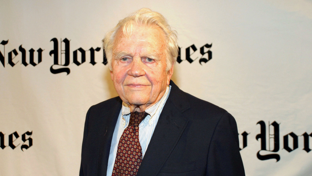 Andy Rooney posing for The New York Times