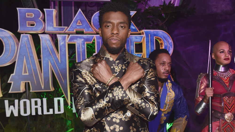 Chadwick Boseman posing for Black Panther