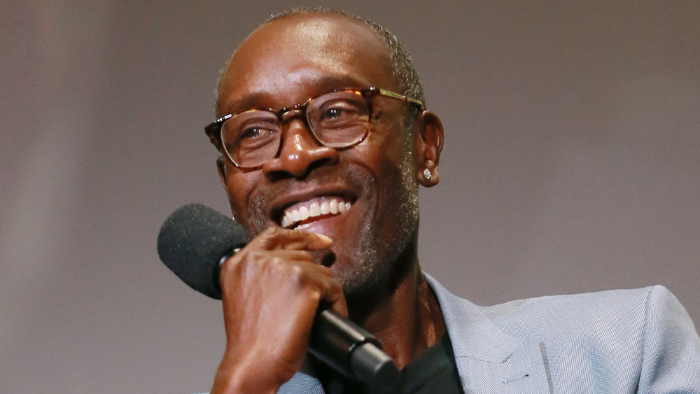 Don Cheadle smiles