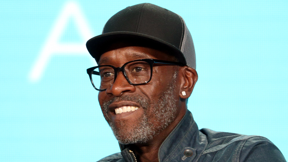 Don Cheadle smiles