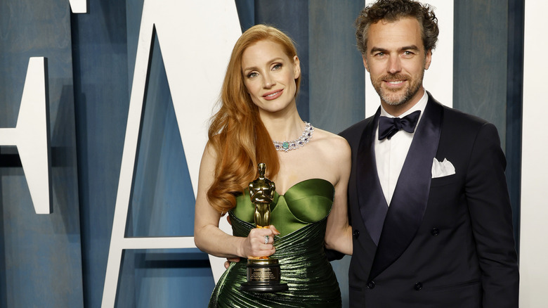 Jessica Chastain and her husband in 2022 after her Oscar win