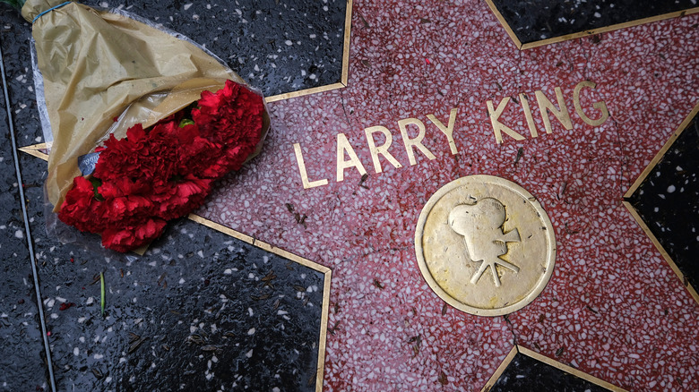 Red roses on Larry King star Hollywood Walk of Fame