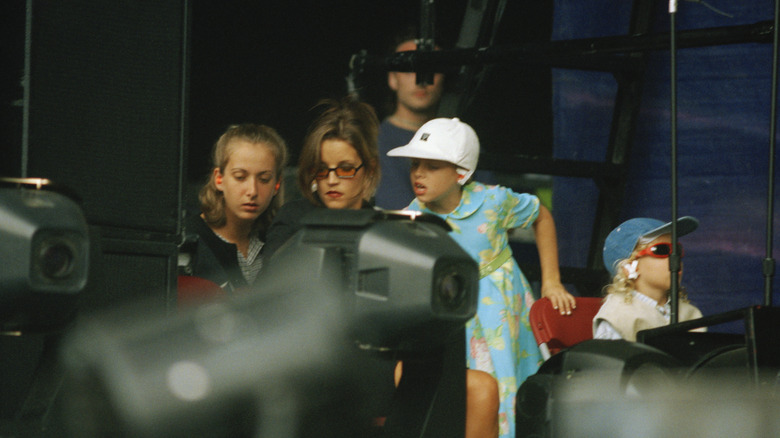 Benjamin Keough with his mother and sister at a concert