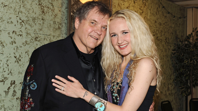 Meat Loaf and his daughter, Pearl Aday posing in an embrace