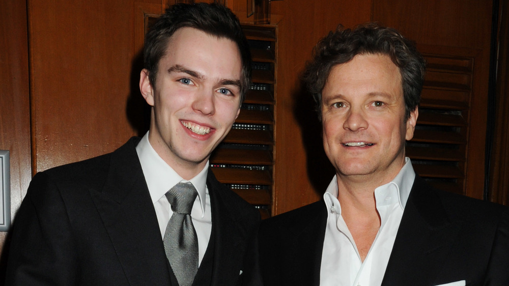 Nicholas Hoult and Colin Firth smiling