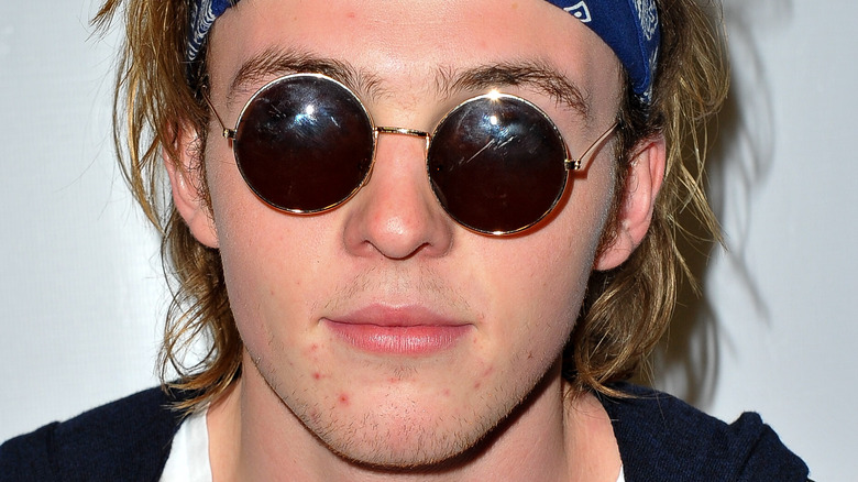 Ryland Lynch wears sunglasses.