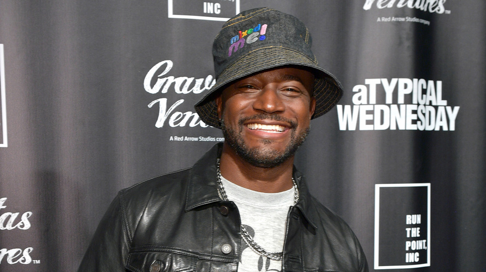 Taye Diggs poses on red carpet