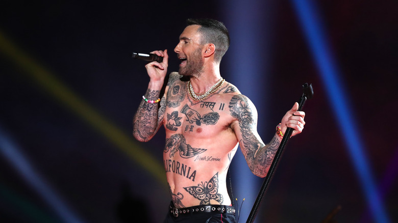 Adam Levine singing shirtless