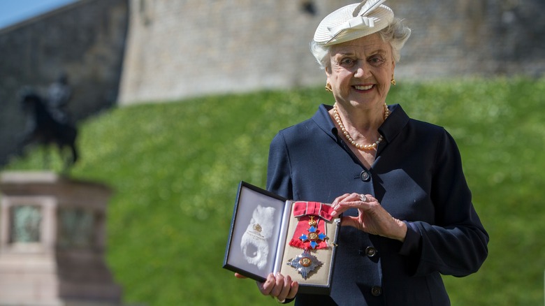 Dame Angela Lansbury with her medal