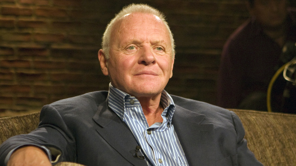 Anthony Hopkins sits onstage at an event