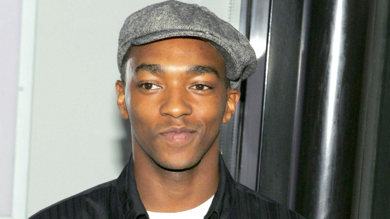 Young Anthony Mackie wearing cap