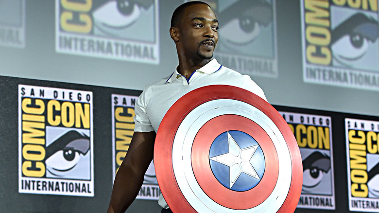 Anthony Mackie holding Captain America shield