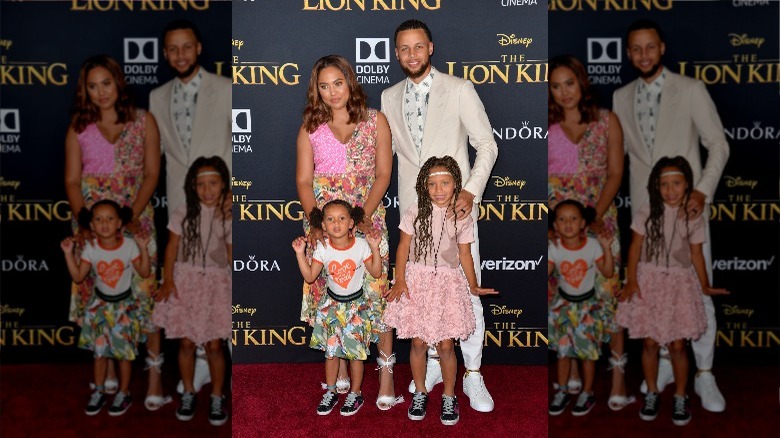 The Currys with their daughters