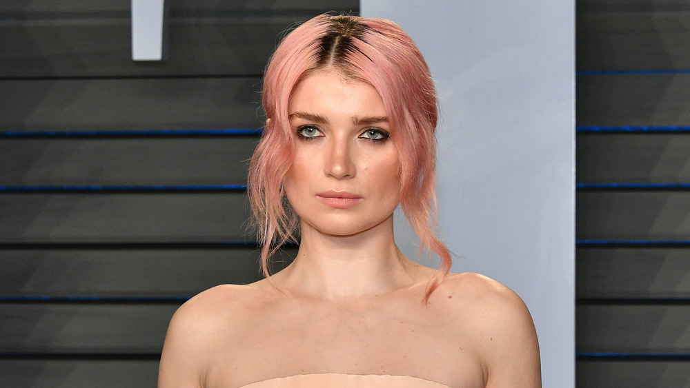 Eve Hewson posing, pink hair