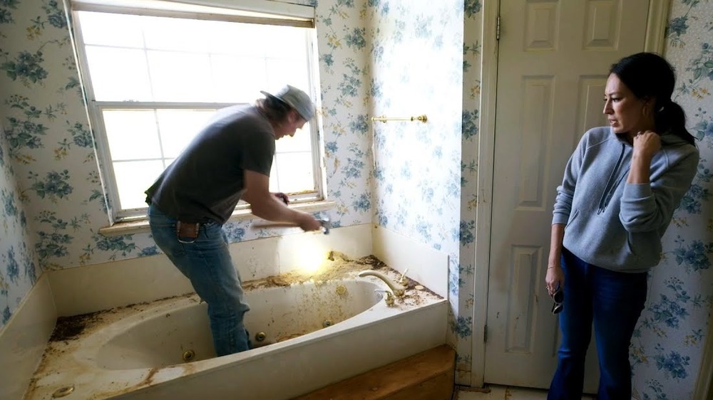 Chip and Joanna renovating a bathroom in Fixer Upper