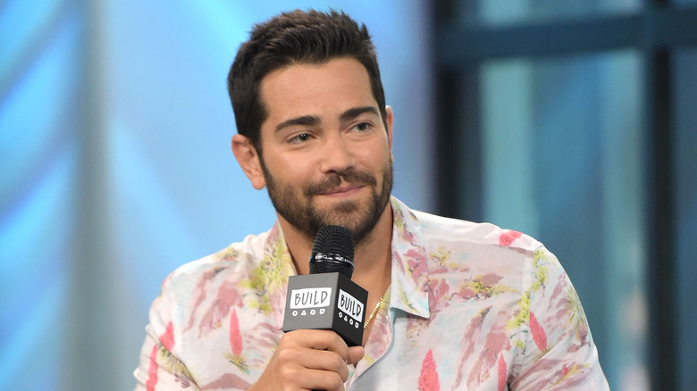 Jesse Metcalfe speaking into a microphone