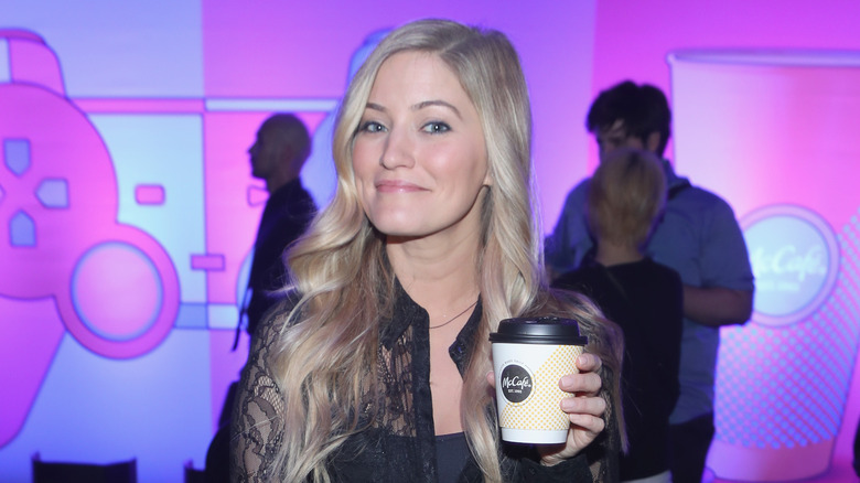 iJustine Justine Ezarik holding McCafe cup of coffee