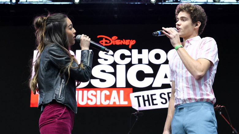 Joshua Bassett and Olivia Rodrigo singing onstage