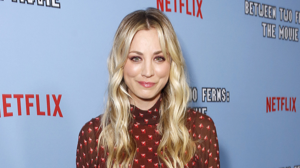 Kaley Cuoco smiling in red