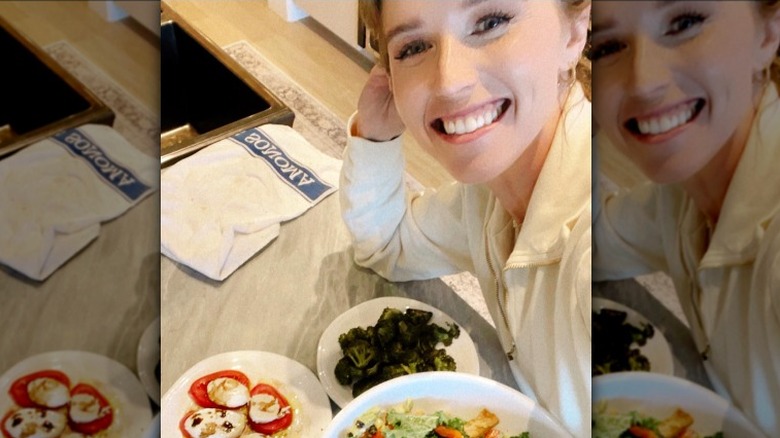 Katherine Schwarzenegger posing with food