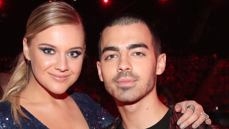 Musicians Kelsea Ballerini (L) and Joe Jonas attend the 2017 iHeartRadio Music Awards which broadcast live on Turner's TBS, TNT, and truTV at The Forum on March 5, 2017 in Inglewood, California. 