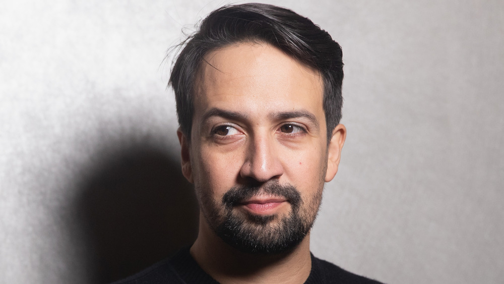 Lin-Manuel Miranda against a grey backdrop